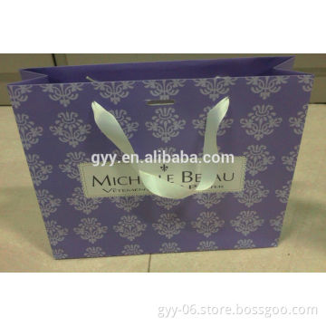 Purple lace shopping paper bag with satin ribbon handle